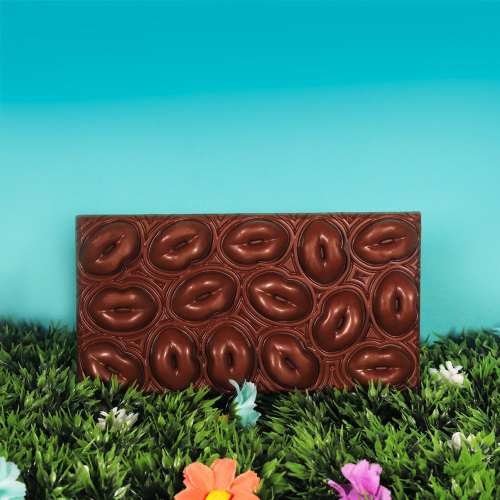 Chocolate kisses bar of chocolate with a chance to win a golden ticket inside by Hotlips by Solange on sunshine grass Bar lips