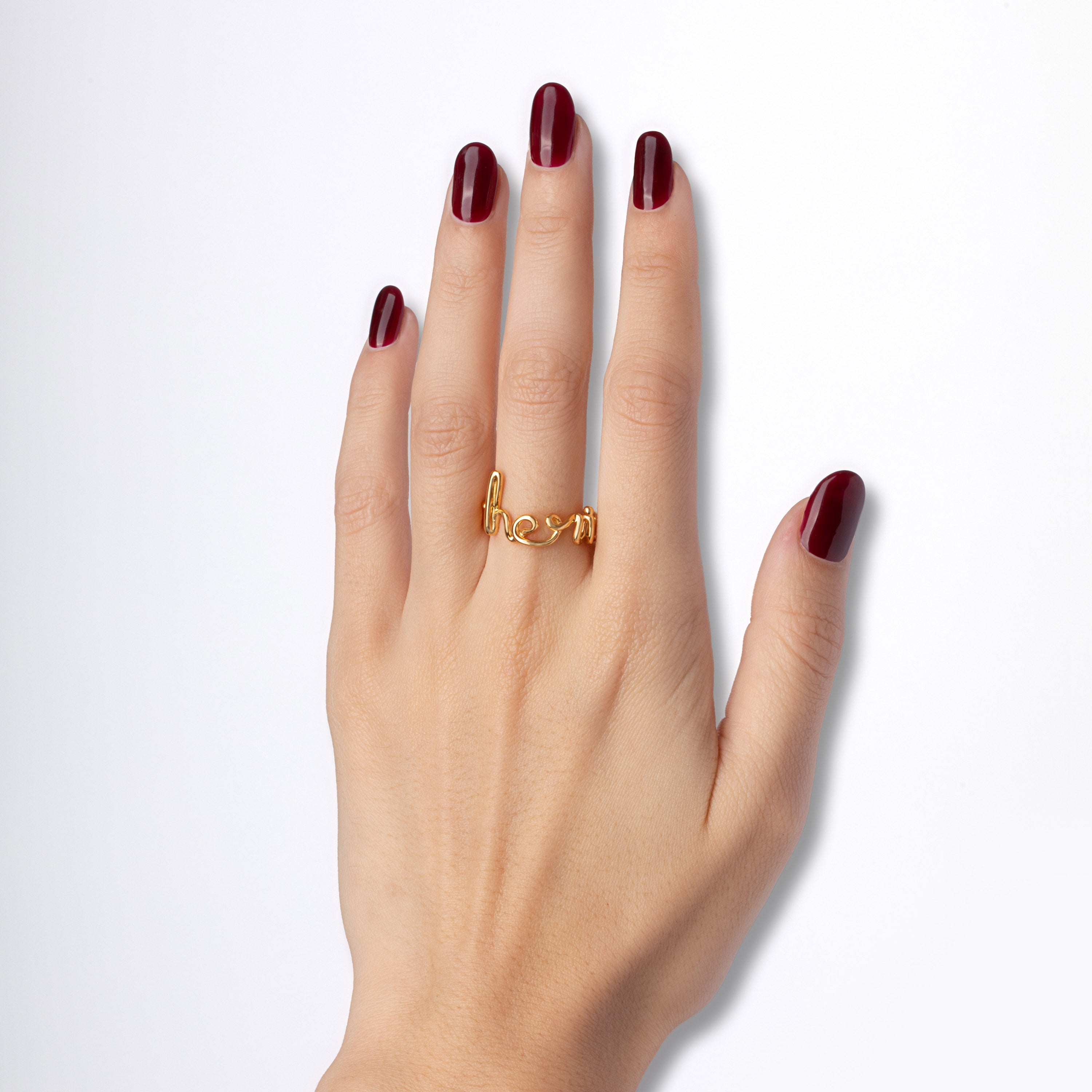 Cherie Hotscripts word wire ring by Hotlips by Solange in gold plated silver on model