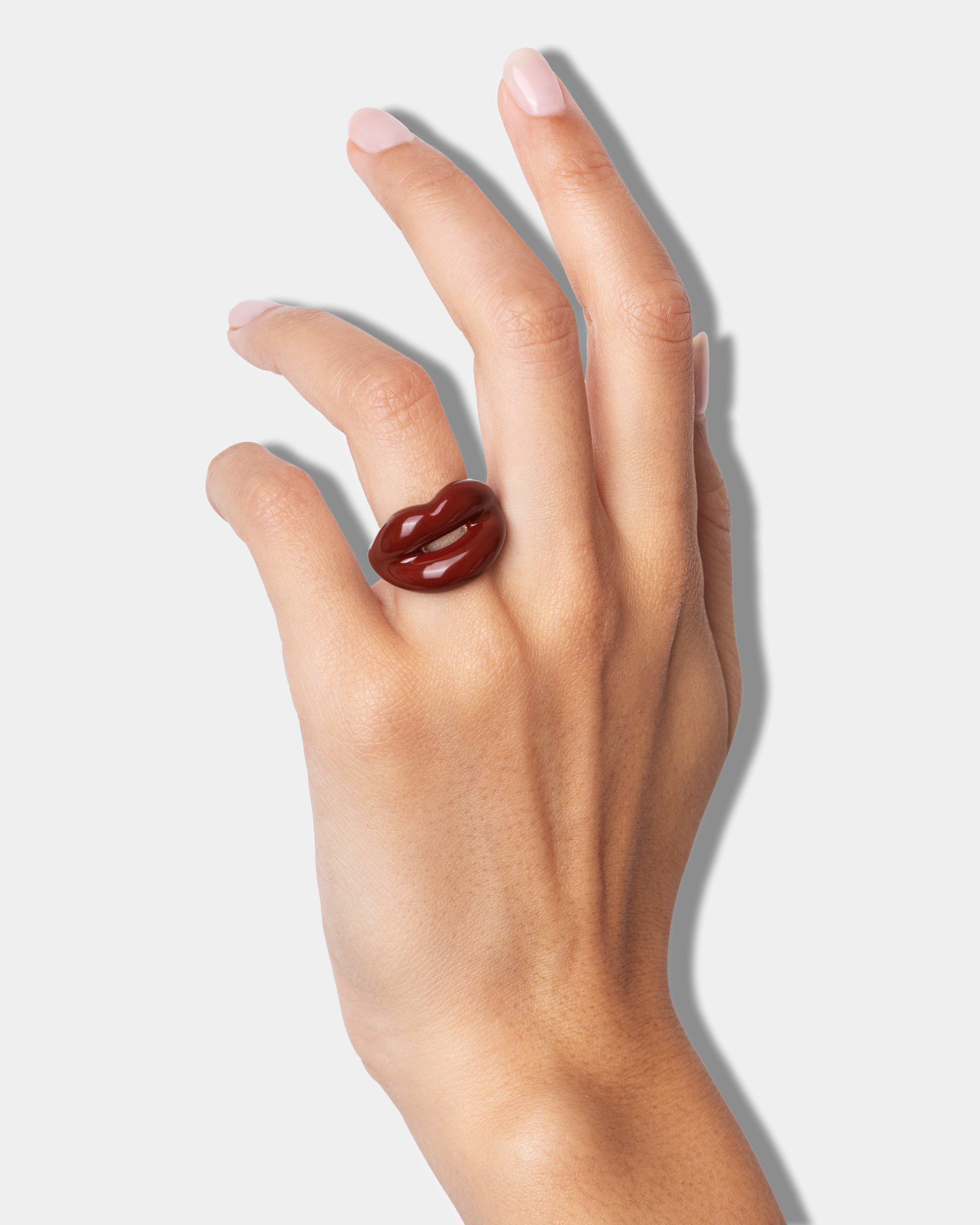 Hotlips by Solange Choclips Silver and Enamel Lip Shaped Ring By Solange Azagury-Partridge front view on model