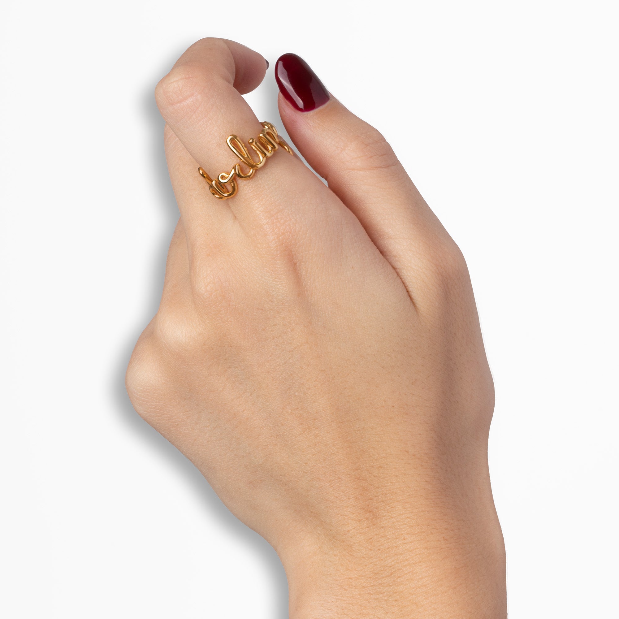 Darling Hotscripts word wire ring by Hotlips by Solange in gold plated silver on model