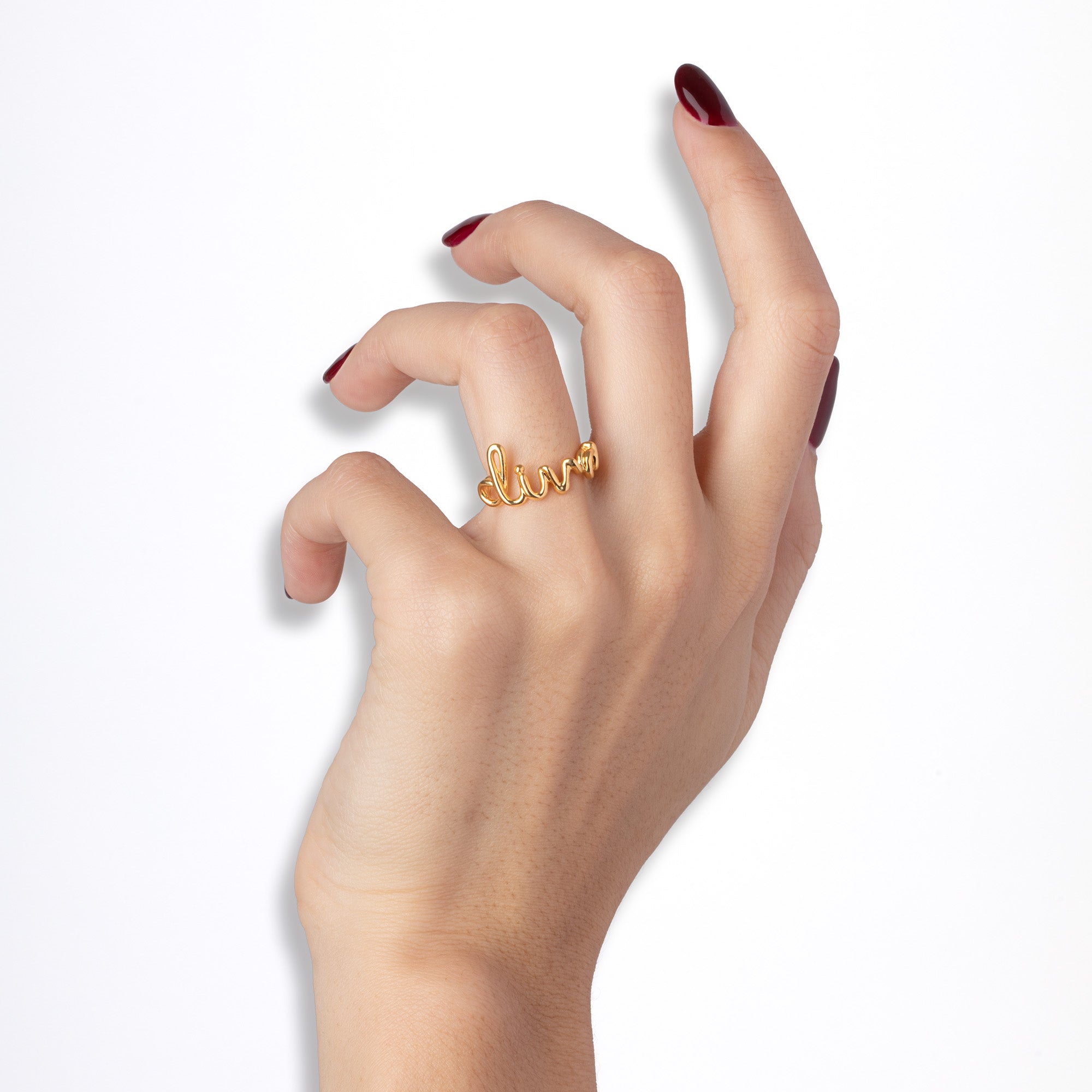 Darling Hotscripts word wire ring by Hotlips by Solange in gold plated silver on model