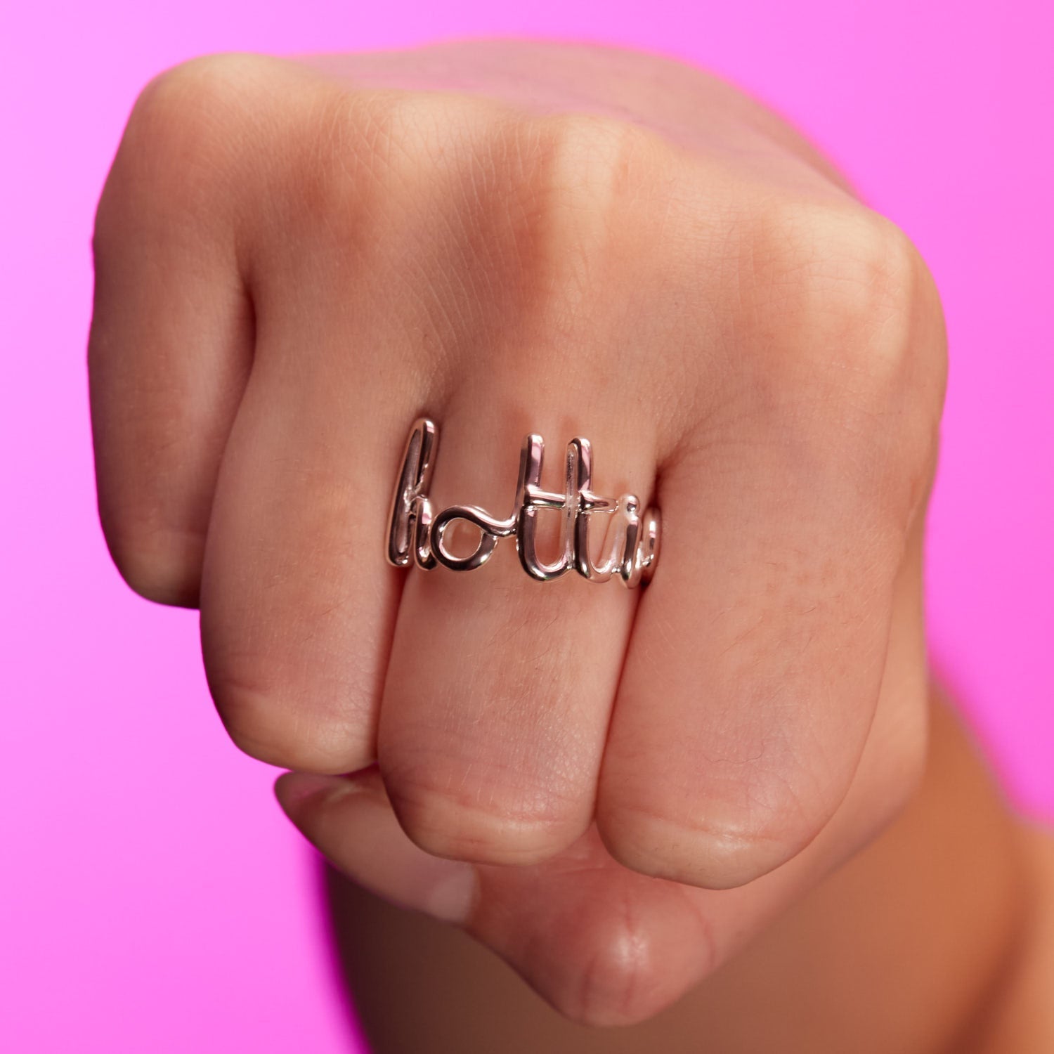 Silver Hotscripts ring back view with a little kiss on hand 2