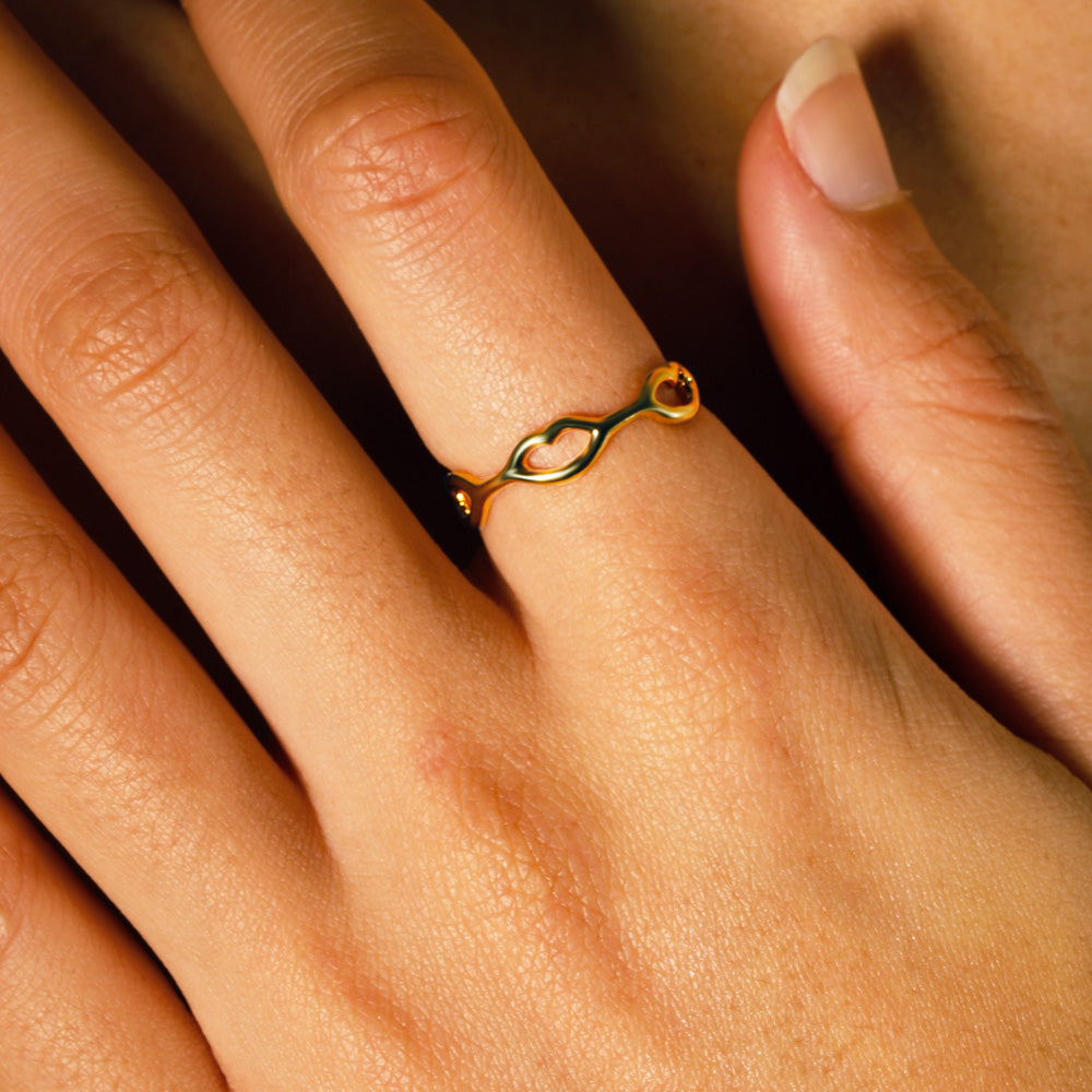Little Kisses ring in gold by British designer Solange Azagury-Partridge front view on model