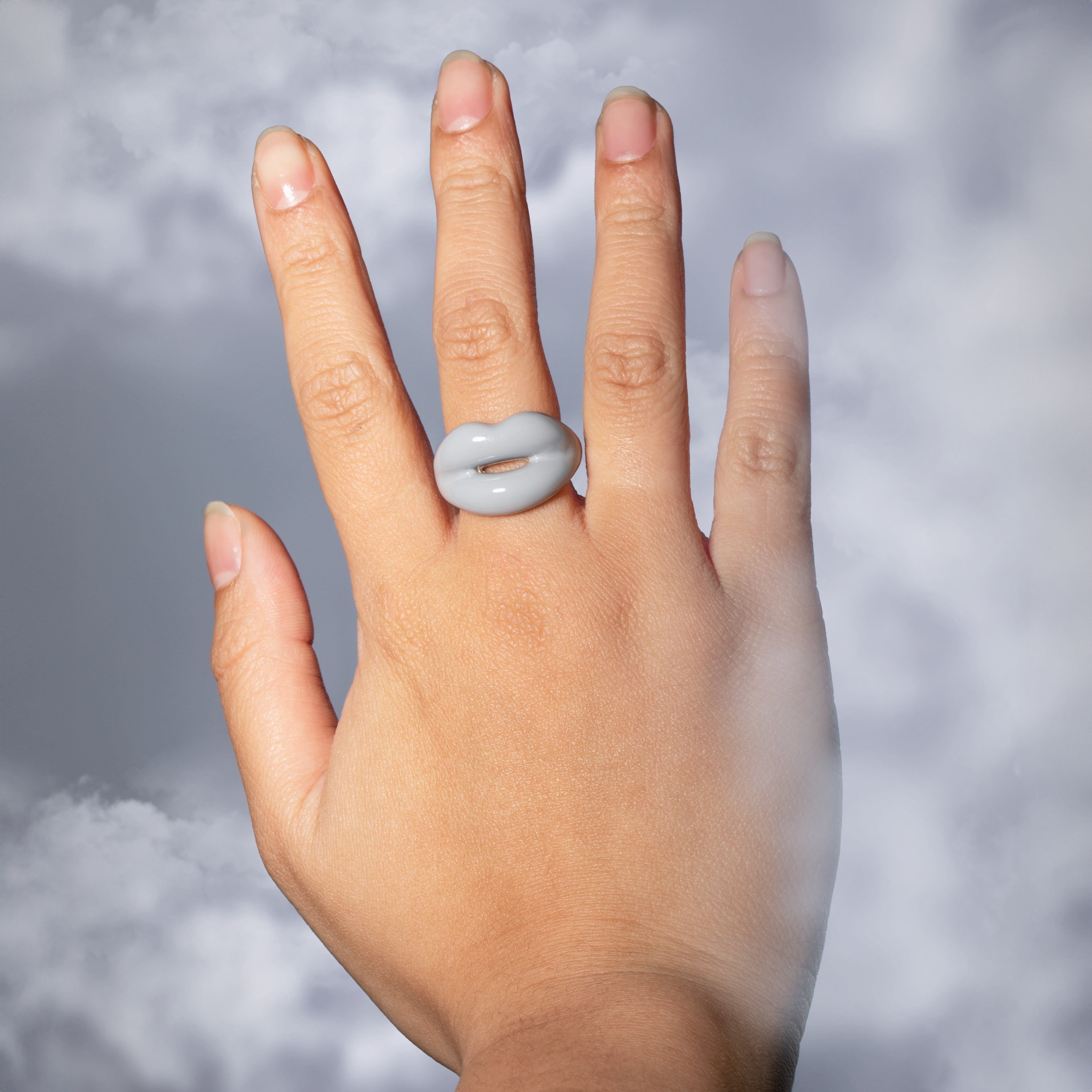 Hotlips By Solange London Sky Hotlips Lip shaped silver and Enamel ring front view by Solange Azagury-Partridge on model