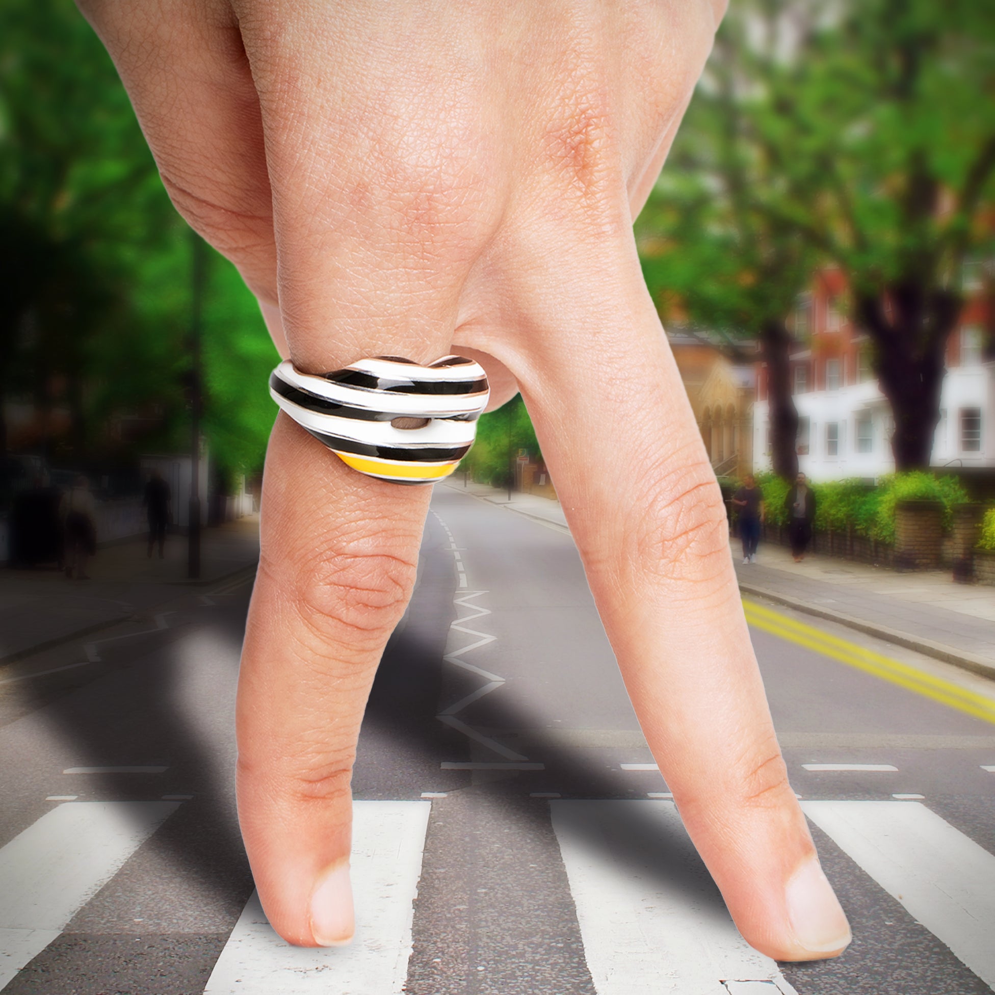 Hotlips By Solange Zebra Crossing Hotlips Lip shaped silver and Enamel ring front view by Solange Azagury-Partridge on model