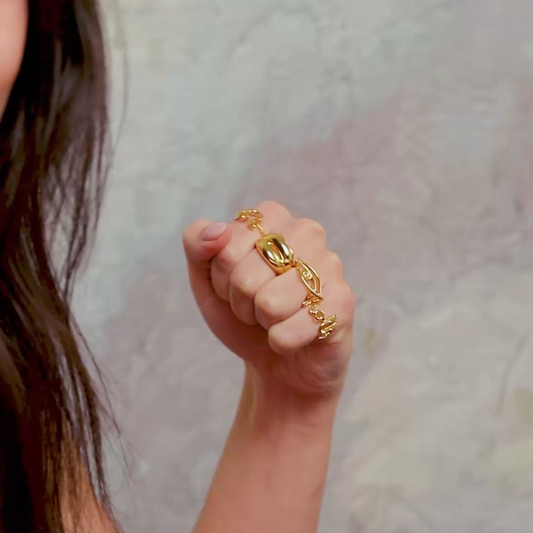 Punch video with Libra Hotlips Eye and Hottie rings in gold vermeil by Hotlips by Solange