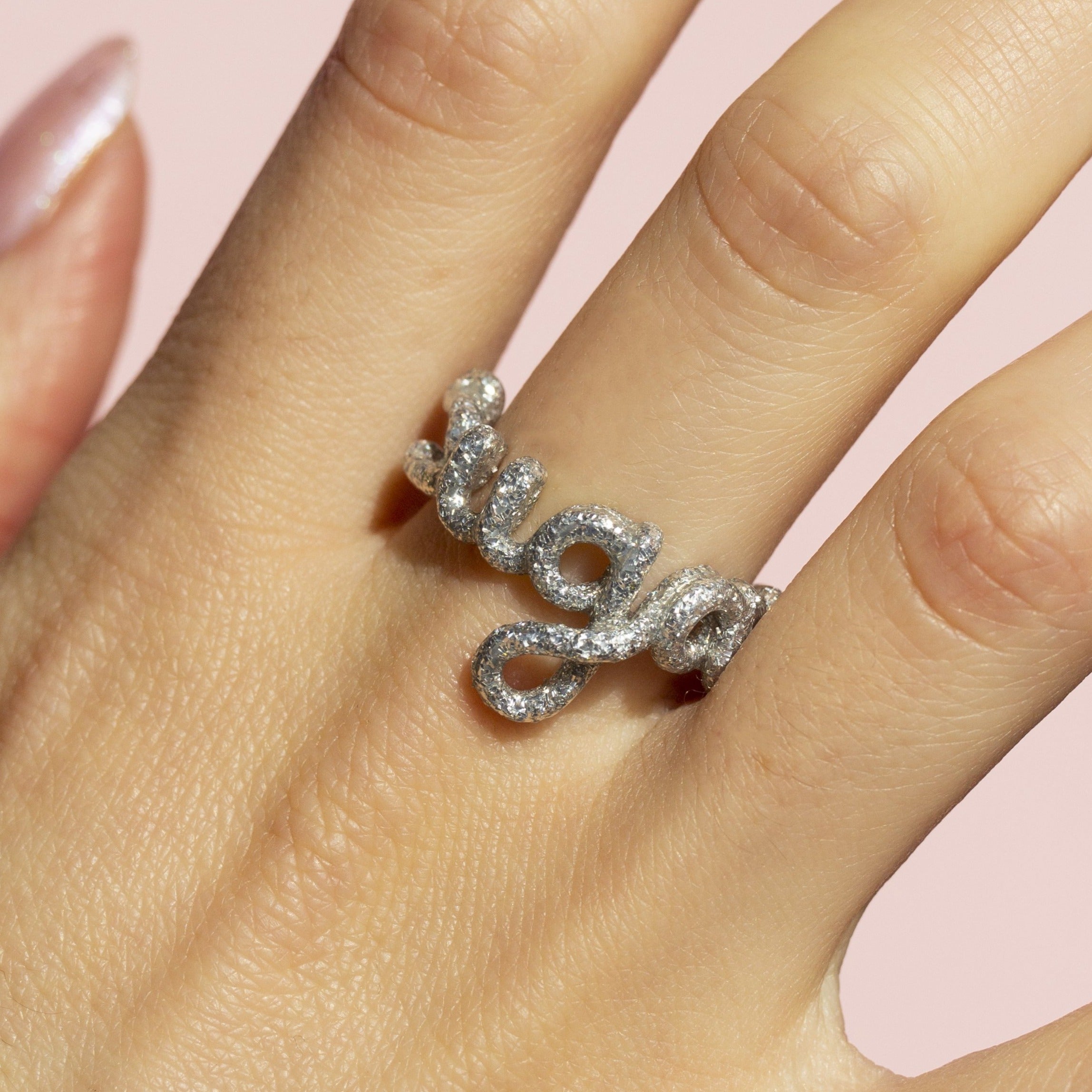 Sugar glitter silver enamel Hotscripts word ring by Solange on hand