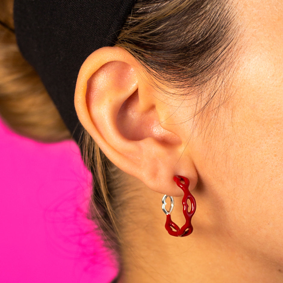 Little Kisses Hoop Earrings red enamel on model