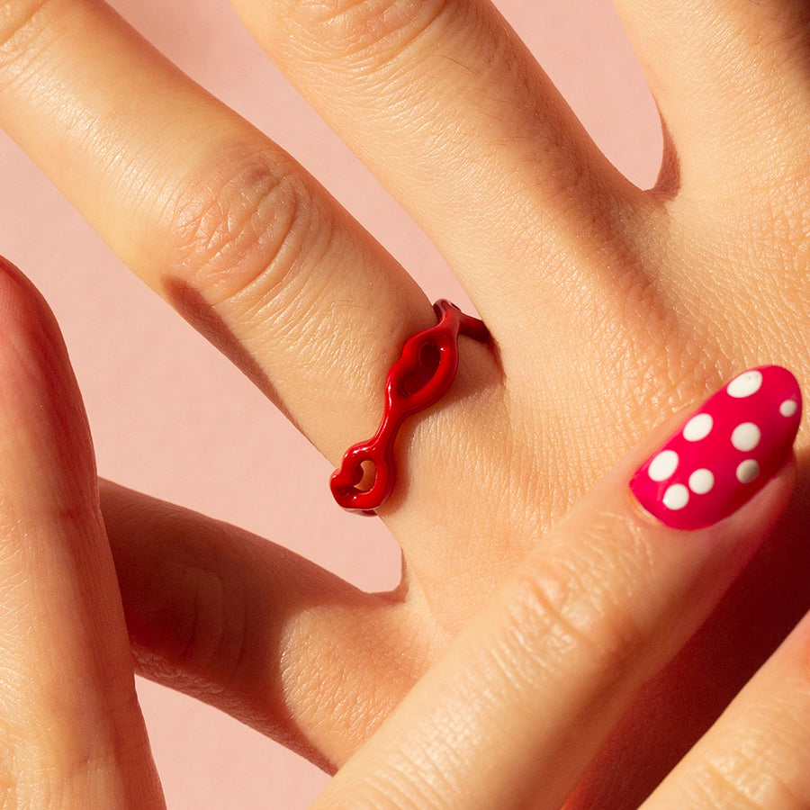 Little Kisses Red enamel ring on hand