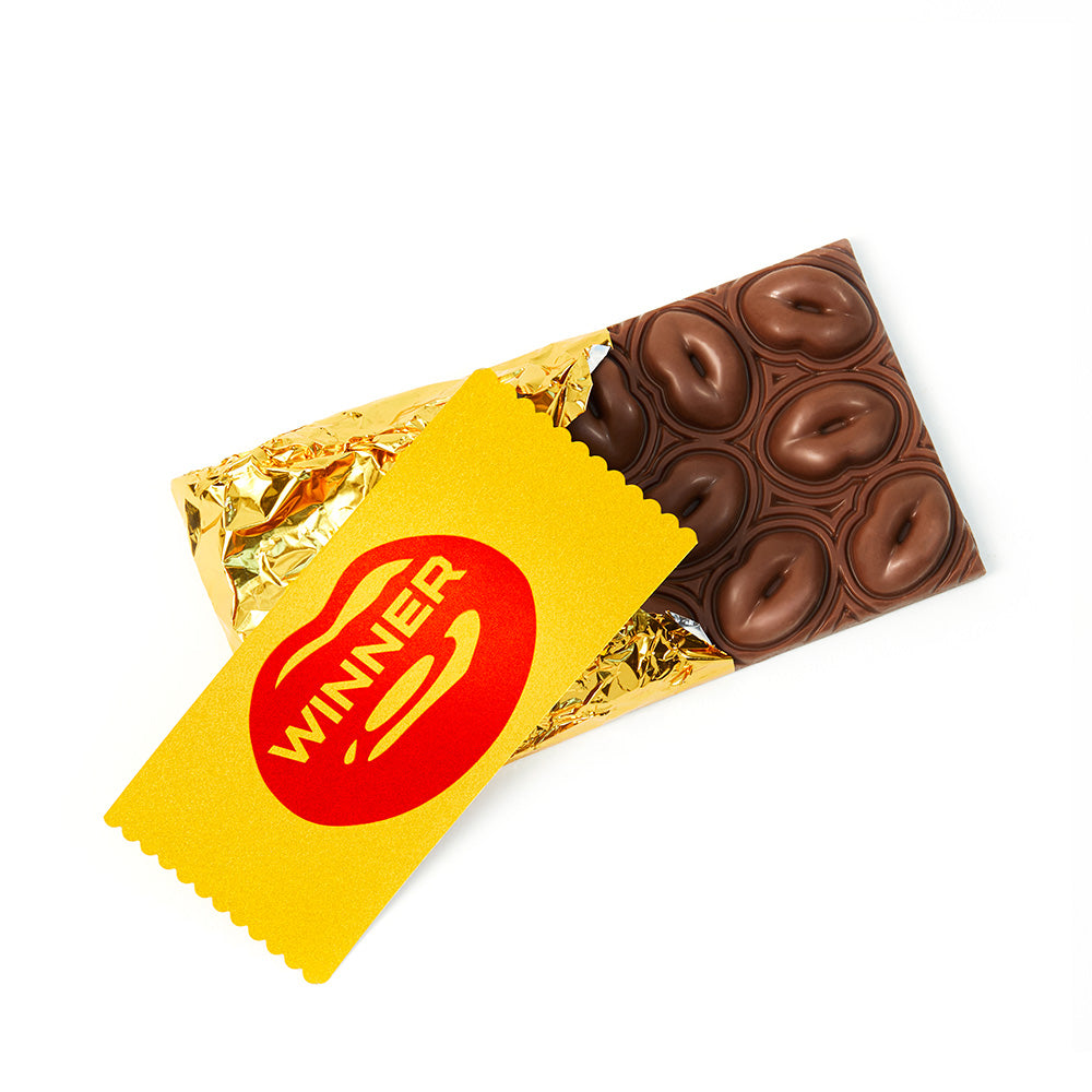 Choclips lip shaped milk chocolate open with willy wonka inspired Golden Ticket Solange