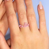 Cutie word Hotscript silver and pink enamel ring by Hotlips by Solange on Model Close Up