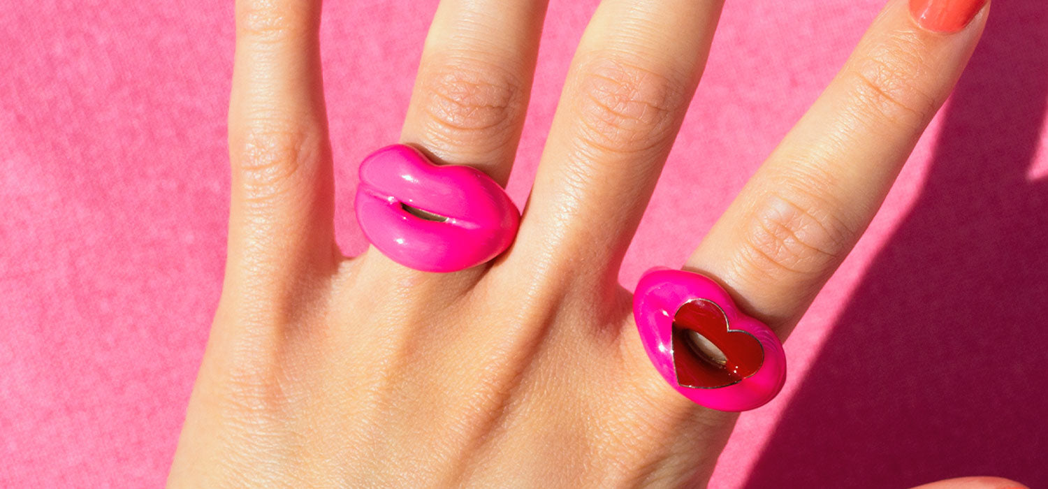 pink rings on hand