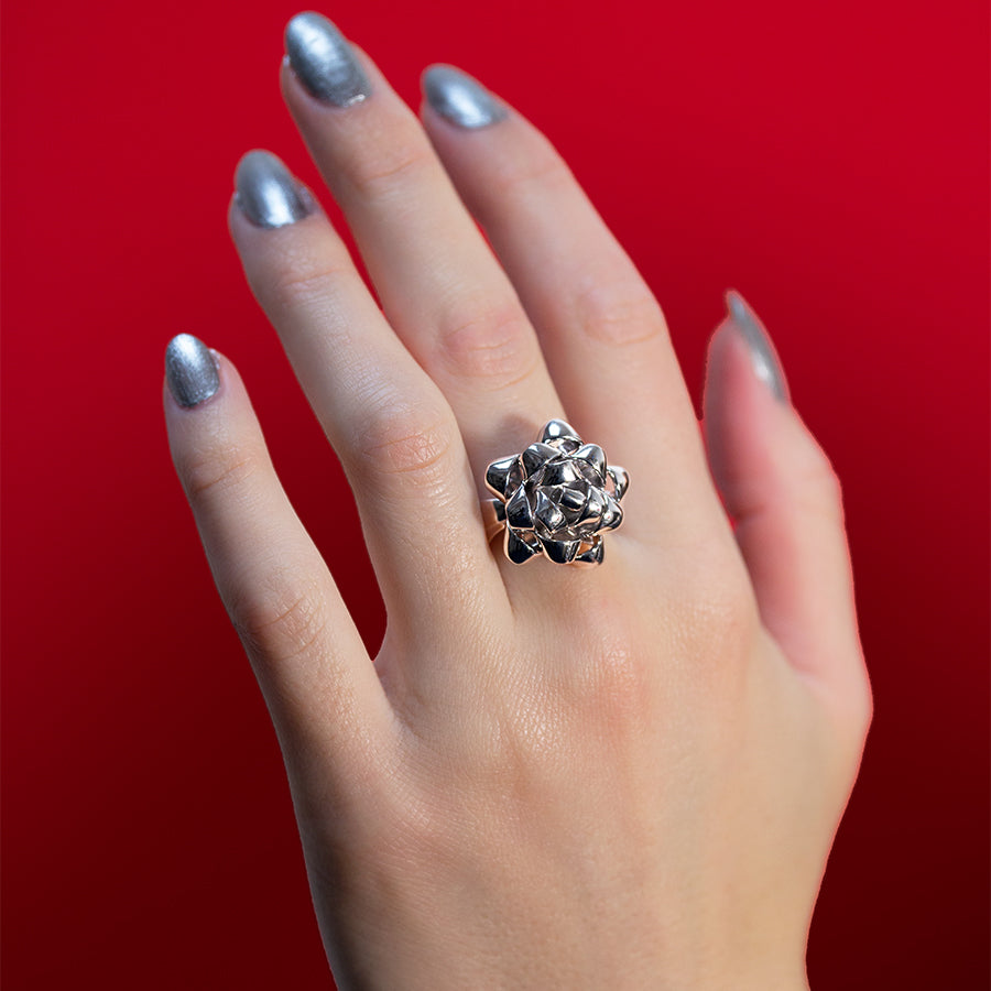 Gift Bow Ring silver by Solange Azgury-Partridge on hand