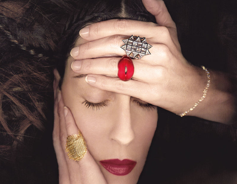 Solange Azagury-Partridge Fine Jewellery with Classic Red Hotlips Witchy Diamond Ring and Fringe Gold Ring on model with a headache