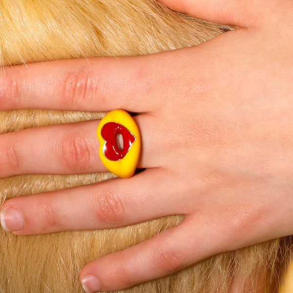 Banana Yellow and Classic Red Love Heart Shaped Hotlips Lip Ring on hand by Solange Azagury-Partridge