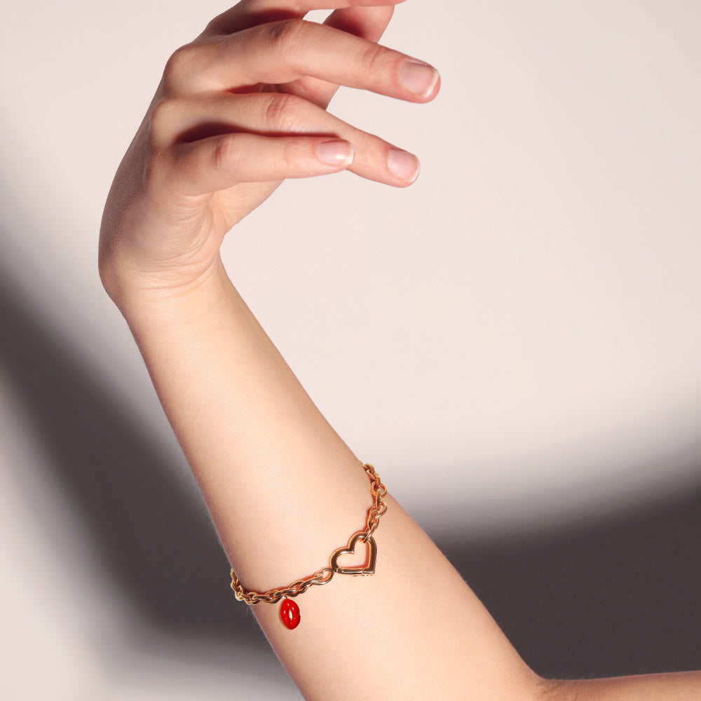 Love and kisses bracelet in gold vermeil by British designer Solange Azagury Partridge front view on model