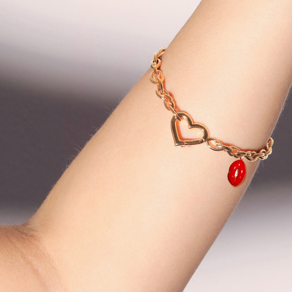 Love and kisses bracelet in gold vermeil by British designer Solange Azagury Partridge on model close up