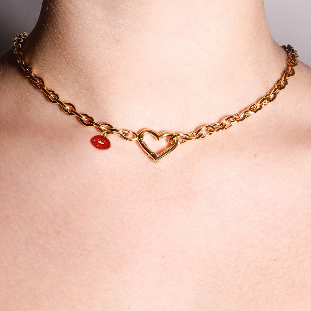Love and kisses necklace in gold vermeil by British designer Solange Azagury Partridge front view on model close up