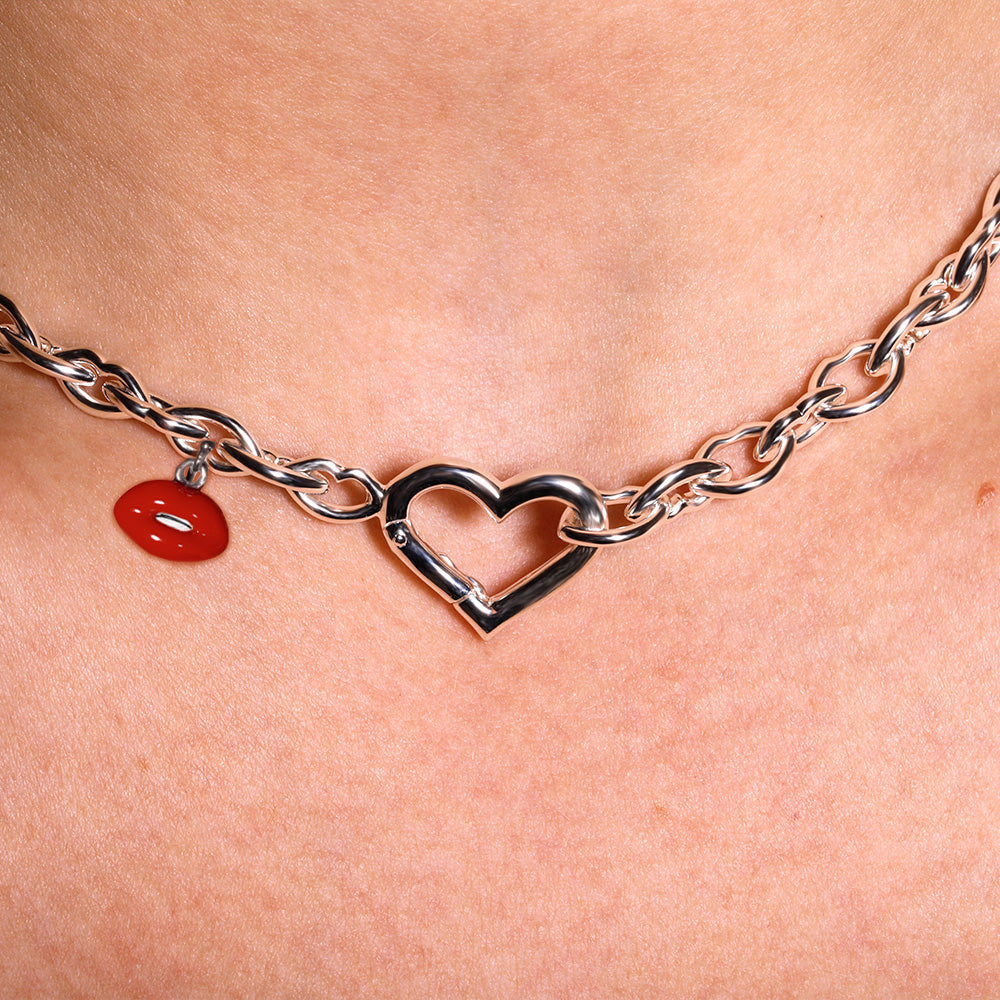 Love and kisses necklace in silver by British designer Solange Azagury Partridge front view crop on model