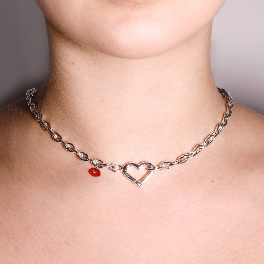 Love and kisses necklace in silver by British designer Solange Azagury Partridge front view on model crop
