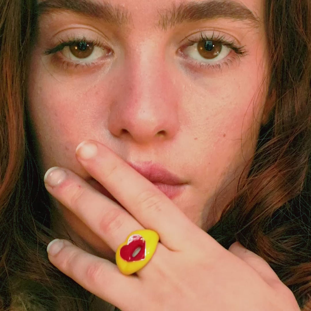 Banana Yellow and Classic Red Love Heart Shaped Hotlips Lip Ring video campaign on hand by Solange Azagury-Partridge