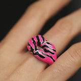 pink neon tiger ring video model wearing, hotlips, solange ring