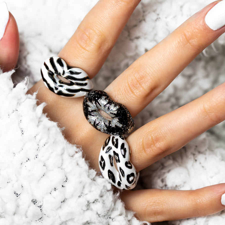 White Tiger Snow Leopard and Glitter Snowflake Hotlips ring on hand