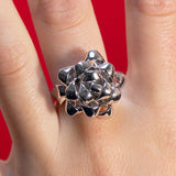 Gift Bow Ring silver by Solange Azgury-Partridge on hand close up