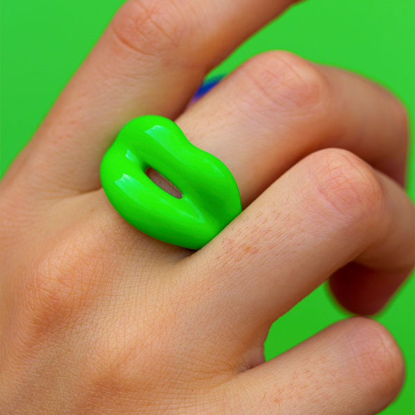 Neon Green silver and enamel Hotlips ring on hand