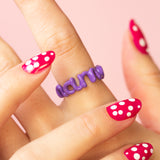 Mama lilac enamel Hotscripts word ring by Solange on hand