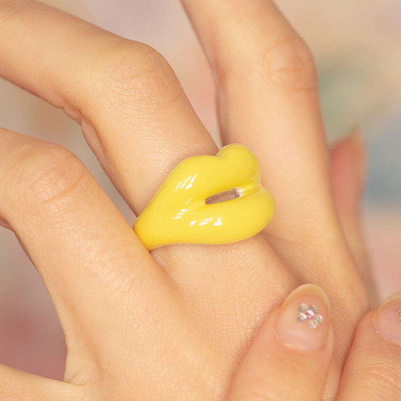 Pastel Yellow enamel and silver Hotlips ring by Solange on model
