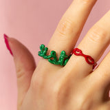 Sister green Hotscripts and Litte Kisses rings by Solange on hand
